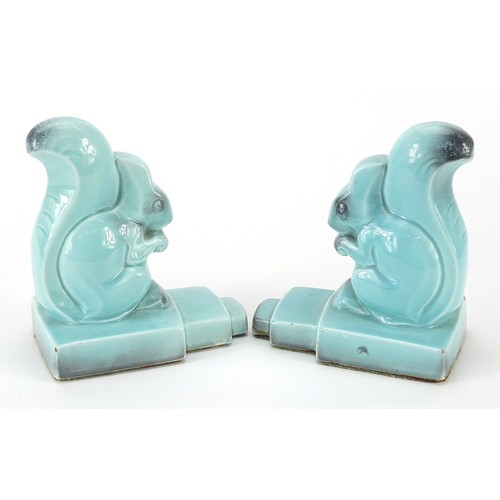 327 - Pair of Art Deco squirrel design bookends, each 14.5cm high