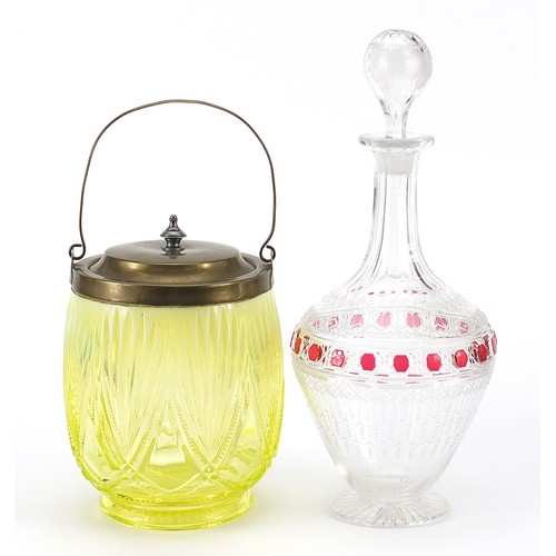 355 - 19th century ruby flashed glass decanter and a uranium glass biscuit barrel, the largest 31.5cm high