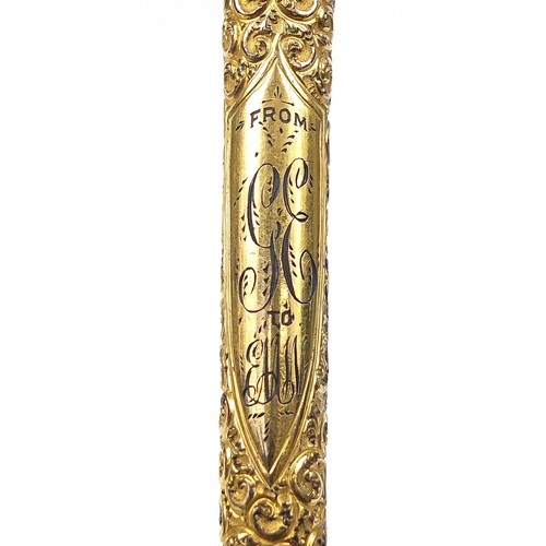 438 - Edwardian bamboo walking sword stick with ornate gilt metal mounts and steel blade, 89cm in length