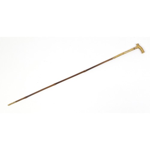 438 - Edwardian bamboo walking sword stick with ornate gilt metal mounts and steel blade, 89cm in length