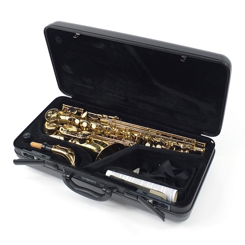 699 - Artemis MKII brass saxophone numbered 0106449,  housed in a fitted case