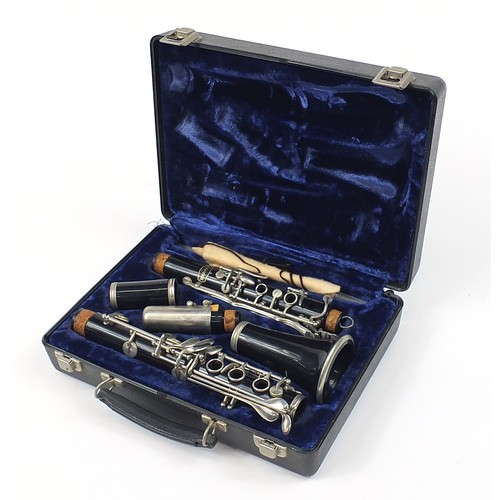 703 - Bundy four piece clarinet by The Selmer Company USA, housed in a fitted case