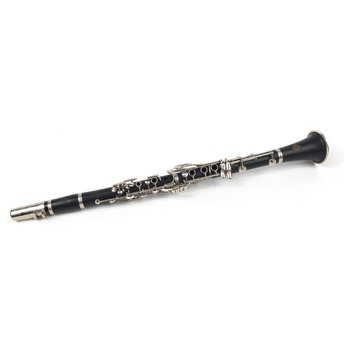 704 - Buffet four piece ebonised clarinet retailed by Crampon & Co, Paris, housed in a fitted box