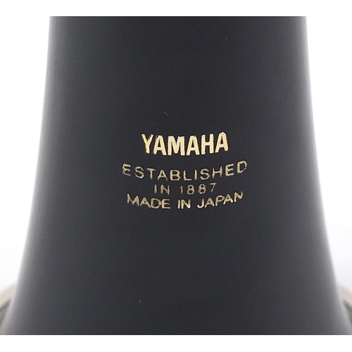 706 - Yamaha ebonised four piece clarinet numbered 26II, housed in a fitted case