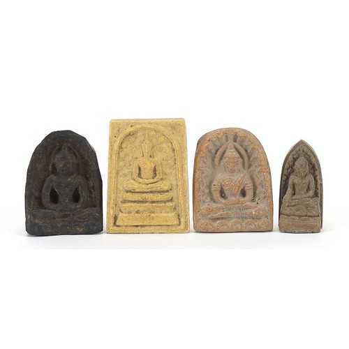 1571 - Four Tibetan carved buddha amulets, the largest 3cm high