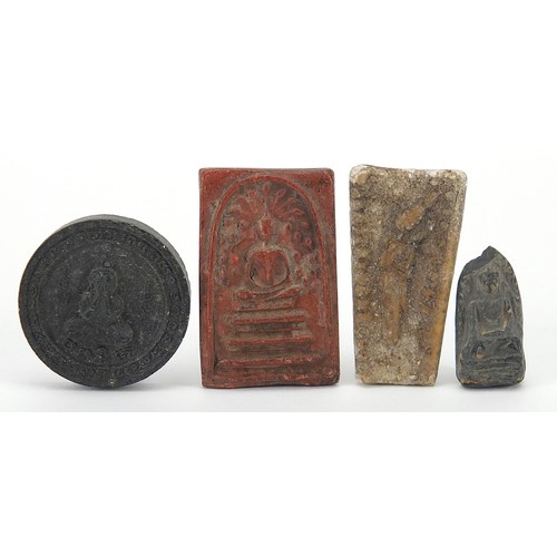 1571a - Four Tibetan carved buddha amulets, the largest 4cm high