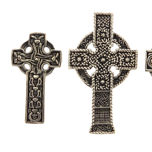 1153A - Four silver Celtic cross pendants, the largest 4.8cm high, total 36.7g