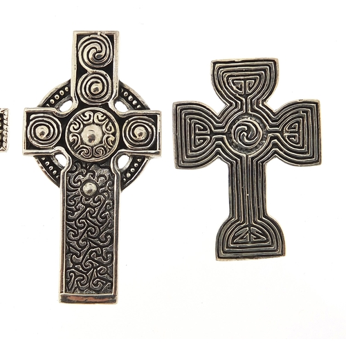 1153A - Four silver Celtic cross pendants, the largest 4.8cm high, total 36.7g