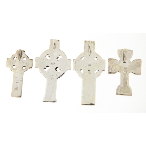 1153A - Four silver Celtic cross pendants, the largest 4.8cm high, total 36.7g