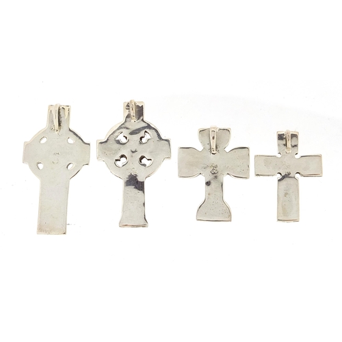 1162A - Four silver Celtic cross pendants, the largest 4.8cm high, total 38.5g