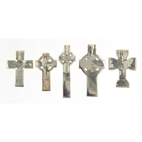 1130A - Five silver Celtic cross pendants, the largest 5cm high, total 42.4g