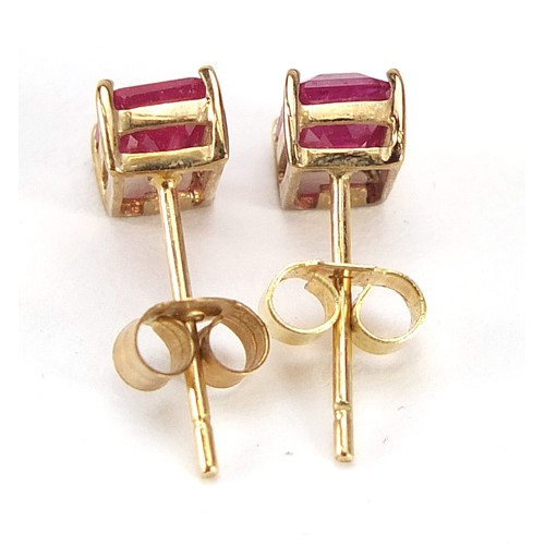 970 - Pair of 9ct gold ruby stud earrings, 6mm high, 0.9g