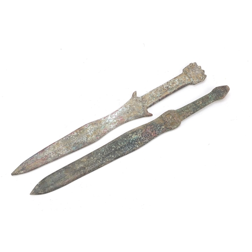 361 - Two Chinese/Islamic patinated bronze short swords, the largest 39cm in length,