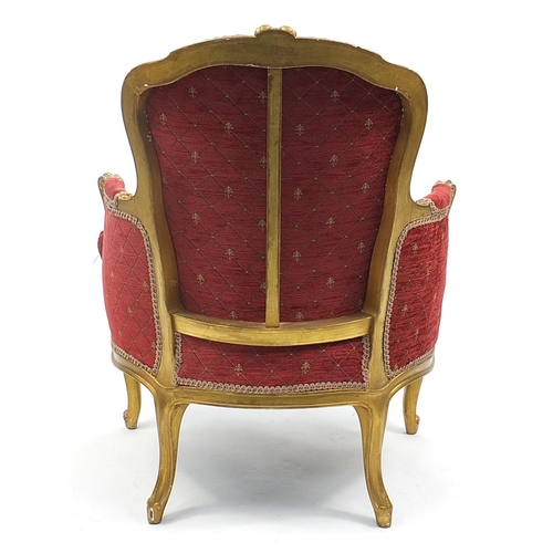 664a - French style gilt open armchair with scrolled feet, 94.5cm high