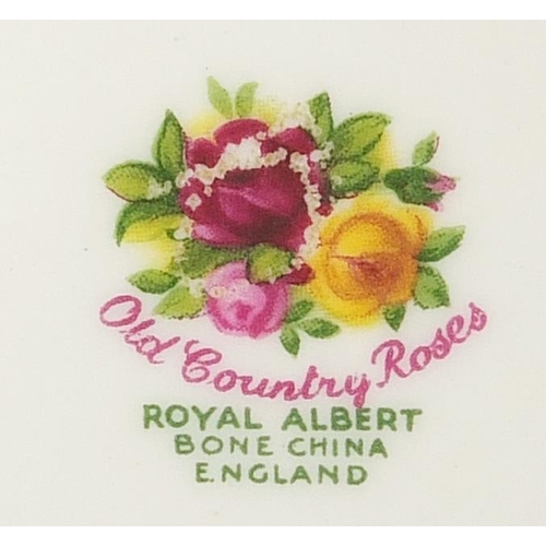 413 - Royal Albert Old Country Roses teaware and dinnerware including teapot, trios, cake stand and dinner... 