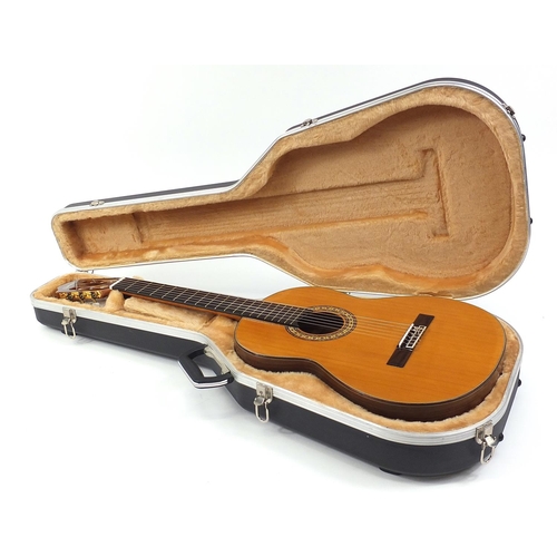 1795 - Camps M-6, cedarwood and rosewood acoustic guitar with protective carry case, serial number 2010739