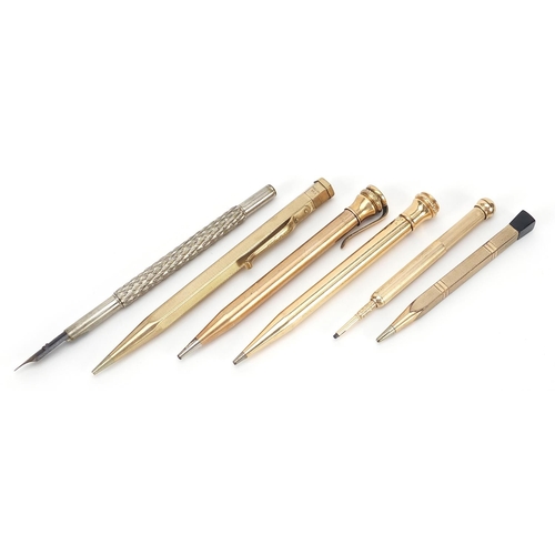 1539 - Five gold plated propelling pencils and a white metal dip pen, including Eversharp and Yard-O-Led