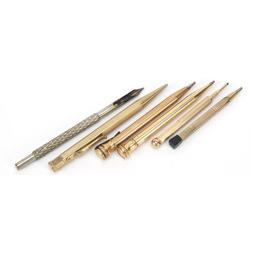 1539 - Five gold plated propelling pencils and a white metal dip pen, including Eversharp and Yard-O-Led