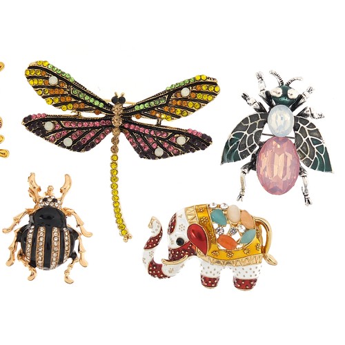 1145A - Seven jewelled and enamel animal and insect brooches including a bird with simulated pearland articu... 