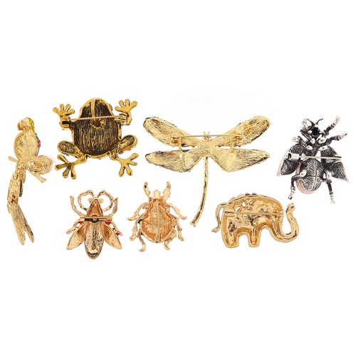 1145A - Seven jewelled and enamel animal and insect brooches including a bird with simulated pearland articu... 