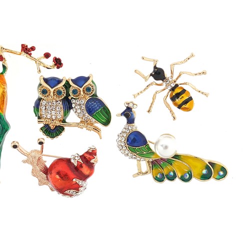 1160A - Seven jewelled and enamel animal and insect brooches including stag, birds of paradise, snail and ow... 