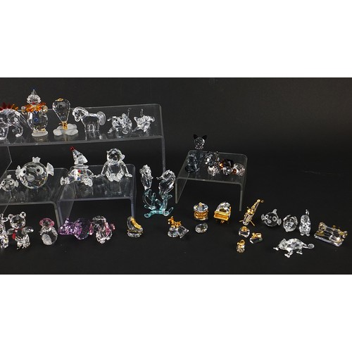 507 - Collection of crystal figures and animals, mostly Swarovski examples, the largest 8cm high