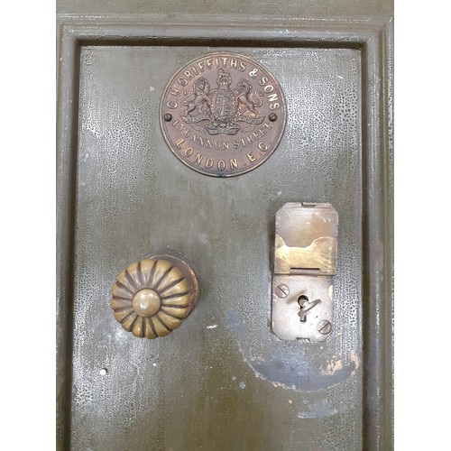 690 - C H Griffiths & Sons cast iron safe with key, 61cm H x 45cm W x 45cm D