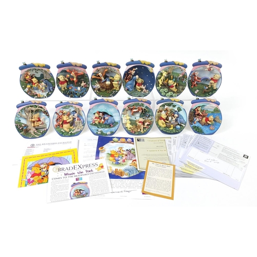 400 - Set of twelve Winnie the Pooh collector's wall plaques by The Bradford Exchange, 17cm high