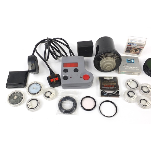 1572 - Large selection of vintage and later camera accessories including lens attachments, tripods and LPL ... 