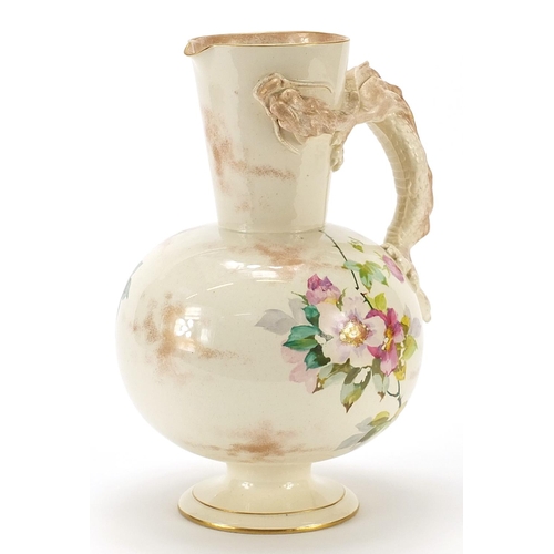 370 - Late 19th century Doulton jug with dragon handle, hand painted with flowers, 25cm high