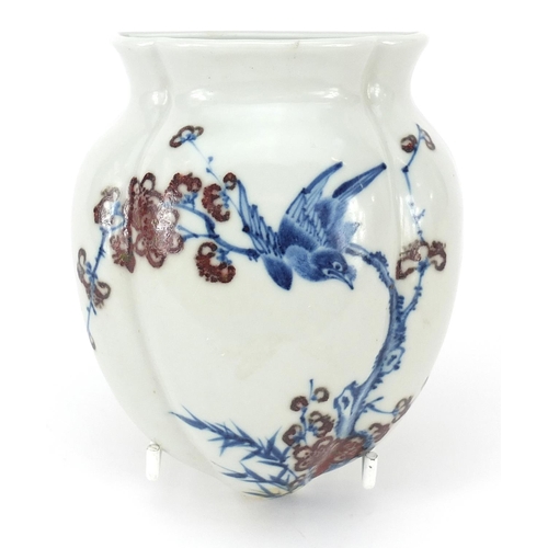 357 - Chinese blue and white with iron red porcelain wall pocket, hand painted with a bird amongst flowers... 