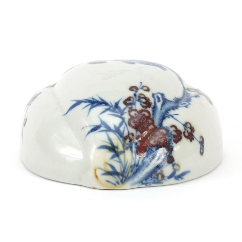 357 - Chinese blue and white with iron red porcelain wall pocket, hand painted with a bird amongst flowers... 