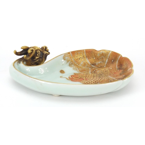 355 - Chinese porcelain dish hand painted with a fish amongst waves and dragon head in relief, iron red ch... 