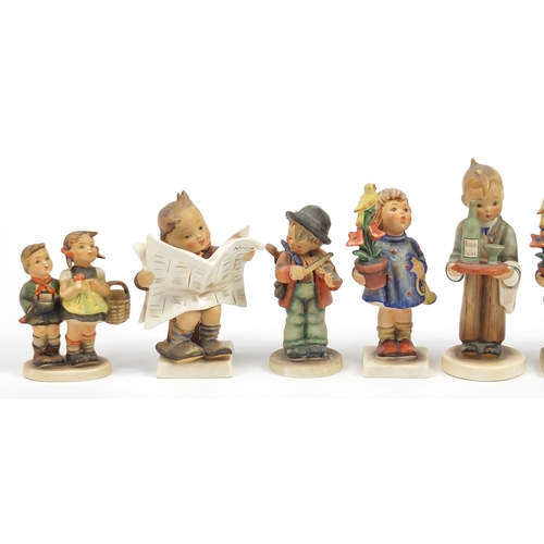 375 - Ten Goebel Hummel figures, the largest 14.5cm high