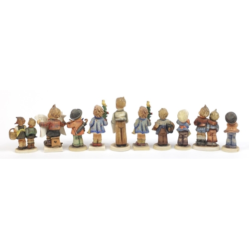 375 - Ten Goebel Hummel figures, the largest 14.5cm high