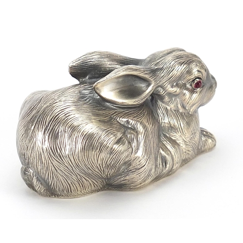 283 - Silver recumbent rabbit with ruby eyes, impressed Russian marks to the base, 6.5cm in length, 61.5g