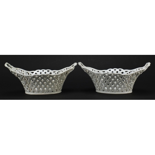 4 - Meissen, Pair of German porcelain pierced baskets with twin handles, each 26.5cm wide