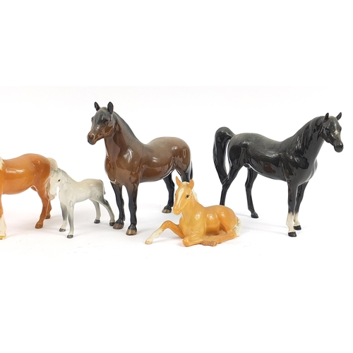 398 - Seven Beswick horses including dapple grey and tan, the largest 20.5cm in length