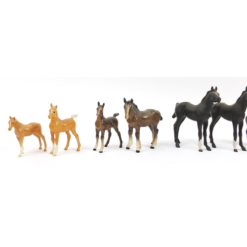 399 - Nine Beswick horses and a Royal Doulton horse, the largest 14.5cm high