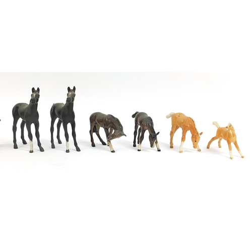 399 - Nine Beswick horses and a Royal Doulton horse, the largest 14.5cm high