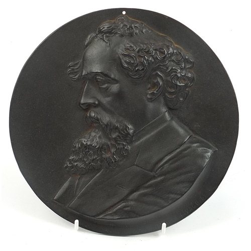 300 - Circular cast iron plaque of Charles Darwin, 22cm in diameter