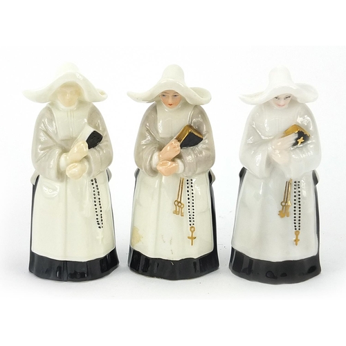 420 - Three Royal Worcester candle snuffers including the Abbess, each 9.5cm high