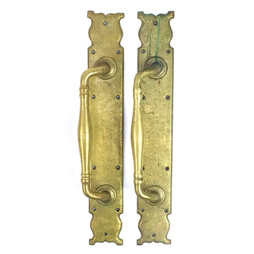 295 - Large pair of brass door handles, impressed Tom Jones Lock & Co London, each 52cm high