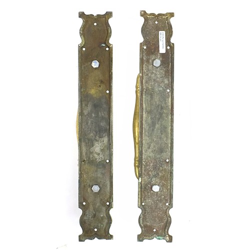 295 - Large pair of brass door handles, impressed Tom Jones Lock & Co London, each 52cm high