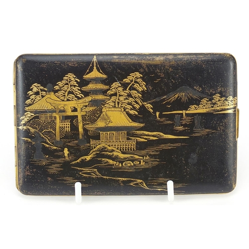 71 - Japanese damascene cigarette case by Fujii Yoshitoyo, engraved with pagodas and a dragon, 12.5cm wid... 