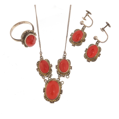 919 - Silver cabochon coral and marcasite jewellery suite comprising necklace, earrings and ring, housed i... 