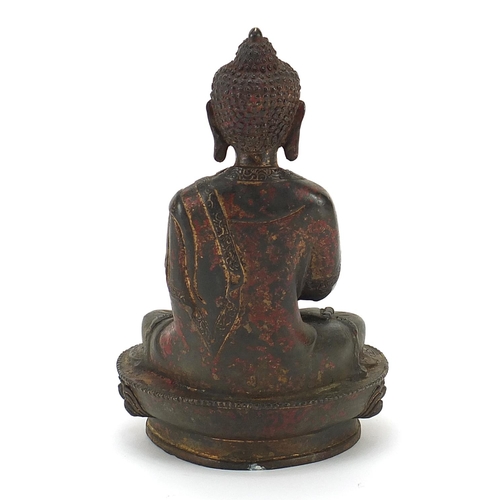 270 - Chino Tibetan patinated bronze figure of seated Buddha, 19.5cm high