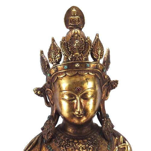 488 - Large Chino Tibetan gilt bronze and jewelled figure of seated Buddha, 50cm high