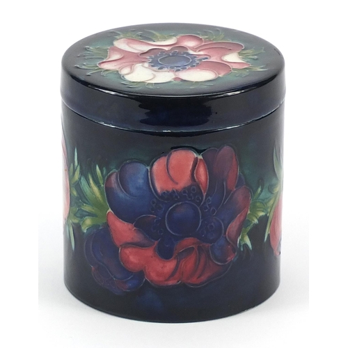 126 - Moorcroft pottery jar and cover hand painted with flowers, 9.5cm high