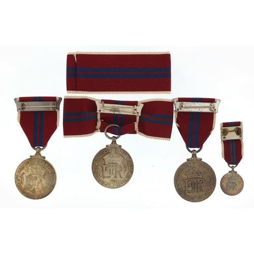 466 - Three Elizabeth II 1953 Coronation medals and a miniature with boxes including a ladies issue